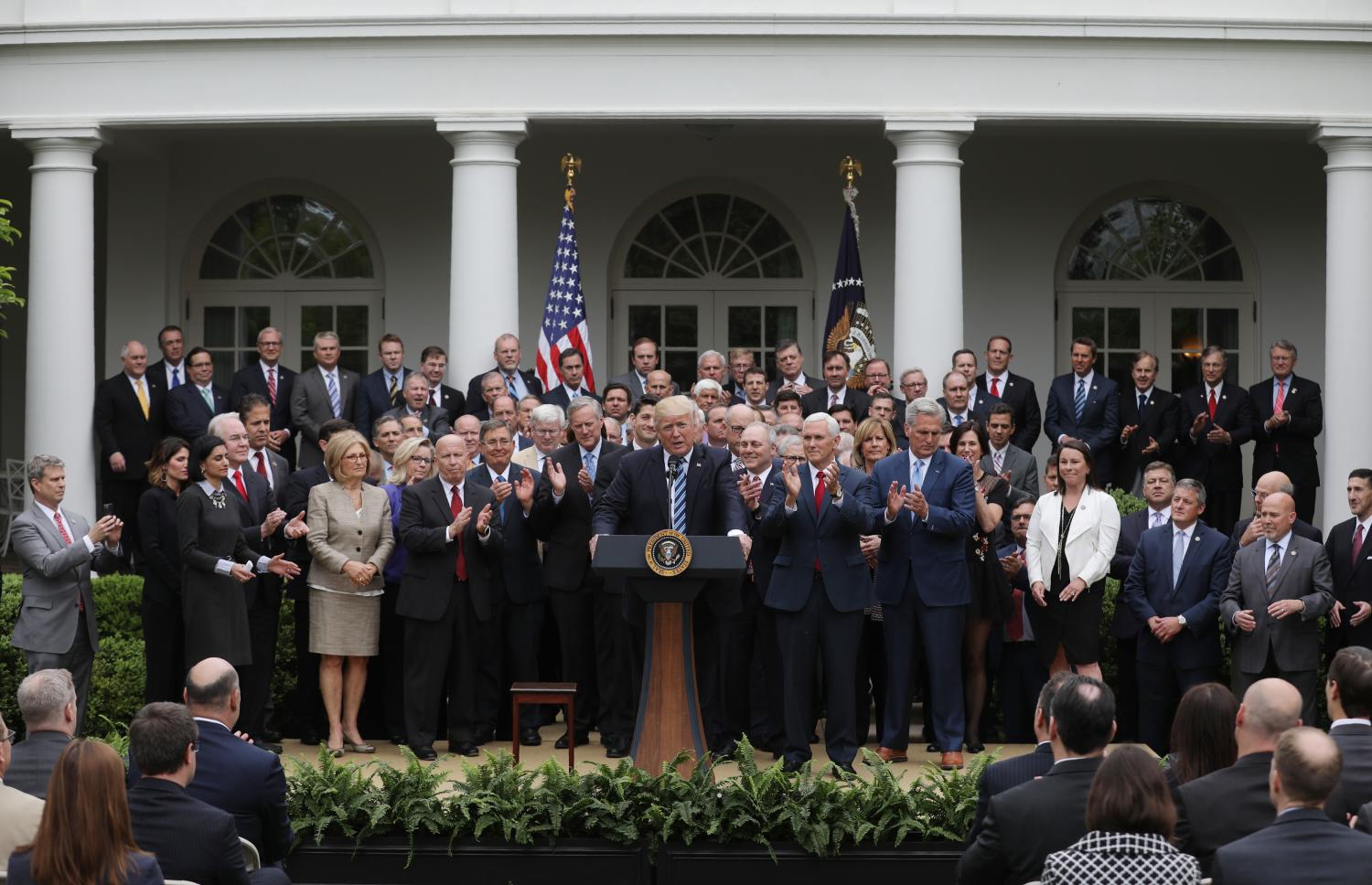 REUTERS/Carlos Barria - President Donald Trump gathers with Congressional Republicans in the Rose Garden after the House of Representatives approved the American Healthcare Act.