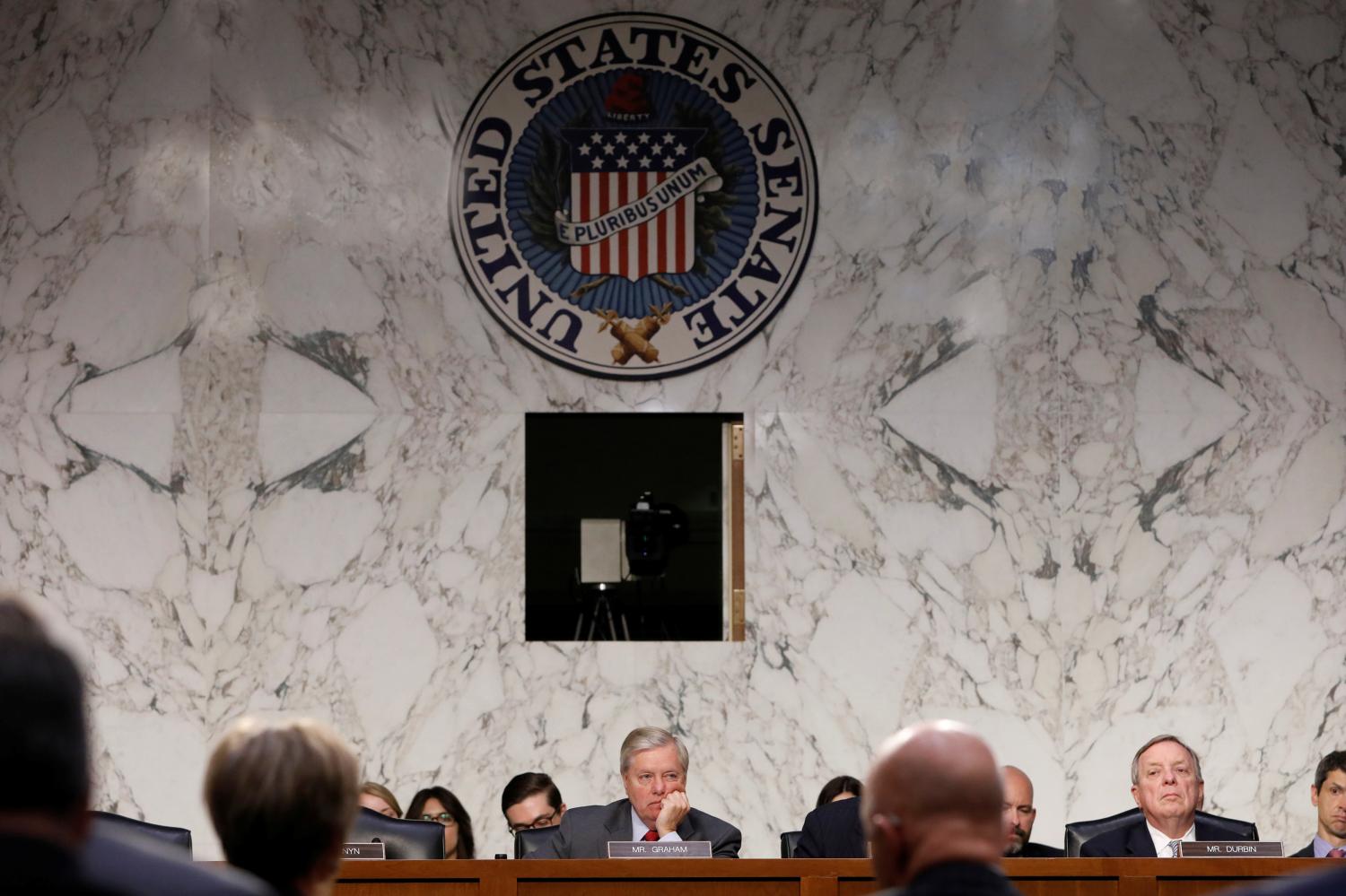 Senators look on at a testimony before the Senate Judiciary Committee on Capitol Hill