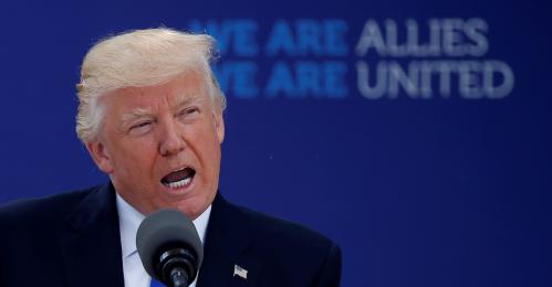 U.S. President Donald Trump delivers remarks at the start of the NATO summit at their new headquarters in Brussels, Belgium, May 25, 2017. REUTERS/Jonathan Ernst - RTX37MLB