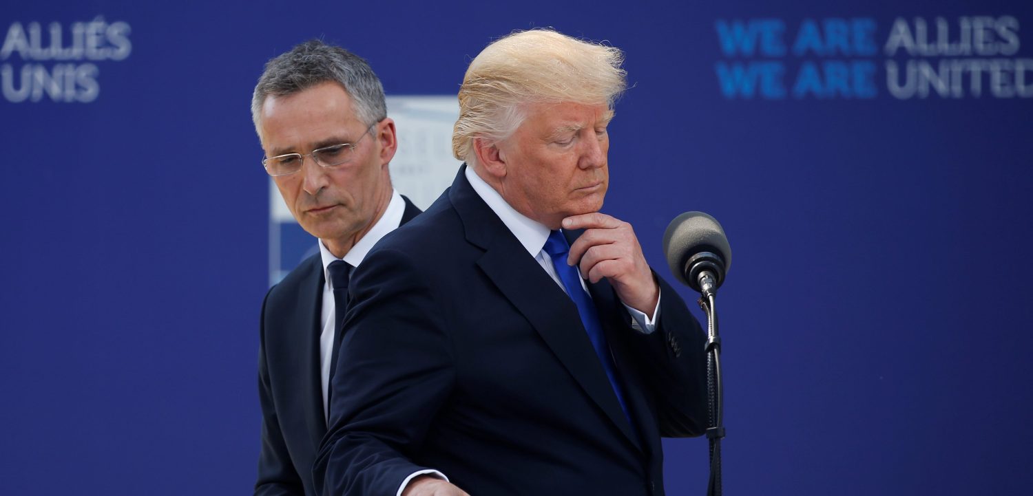 U.S. President Donald Trump reacts as he speaks beside NATO Secretary General Jens Stoltenberg at the start of the NATO summit at their new headquarters in Brussels, Belgium, May 25, 2017.REUTERS/Jonathan Ernst - RTX37MBY