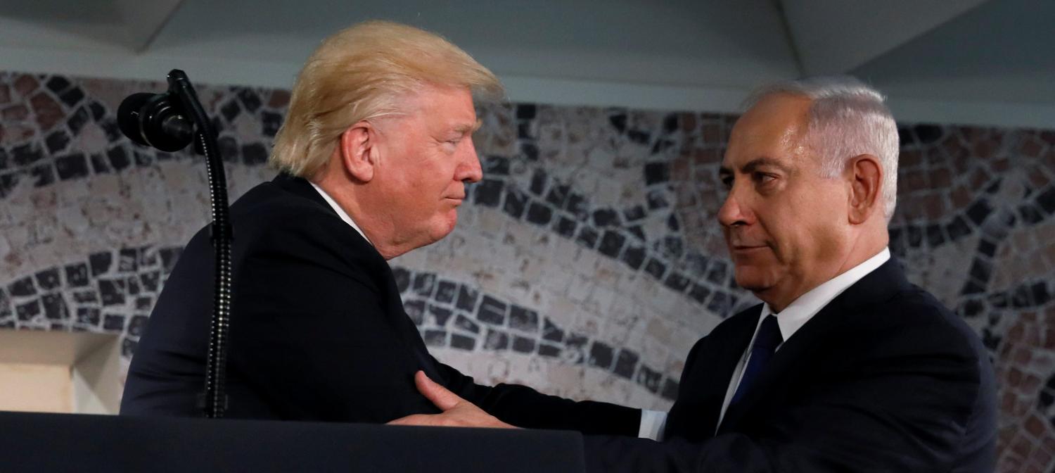 U.S. President Donald Trump (L) embraces Israel's Prime Minister Benjamin Netanyahu before his remarks at the Israel Museum in Jerusalem May 23, 2017. REUTERS/Jonathan Ernst - RTX3795N