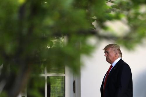 U.S. President Donald Trump walks along the Rose Garden as he returns from a day trip to Atlanta on the South Lawn of the White House in Washington, U.S., April 28, 2017. REUTERS/Carlos Barria - RTS14EJZ