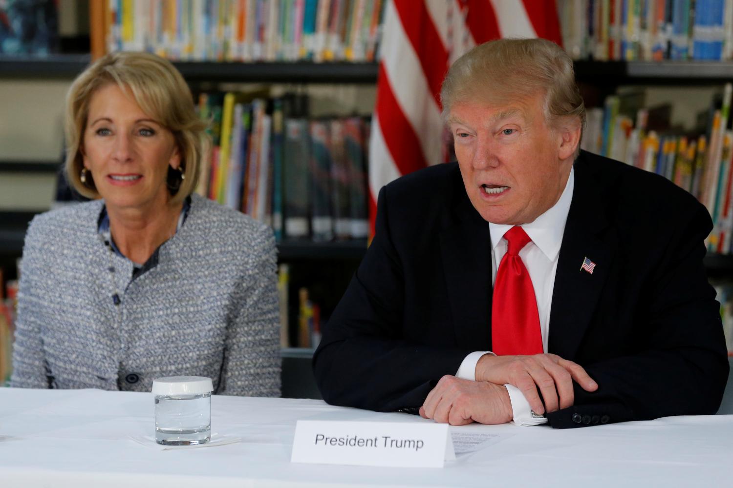 Trump and DeVos meet with parents and teachers at Saint Andrew Catholic School in Orlando, Florida