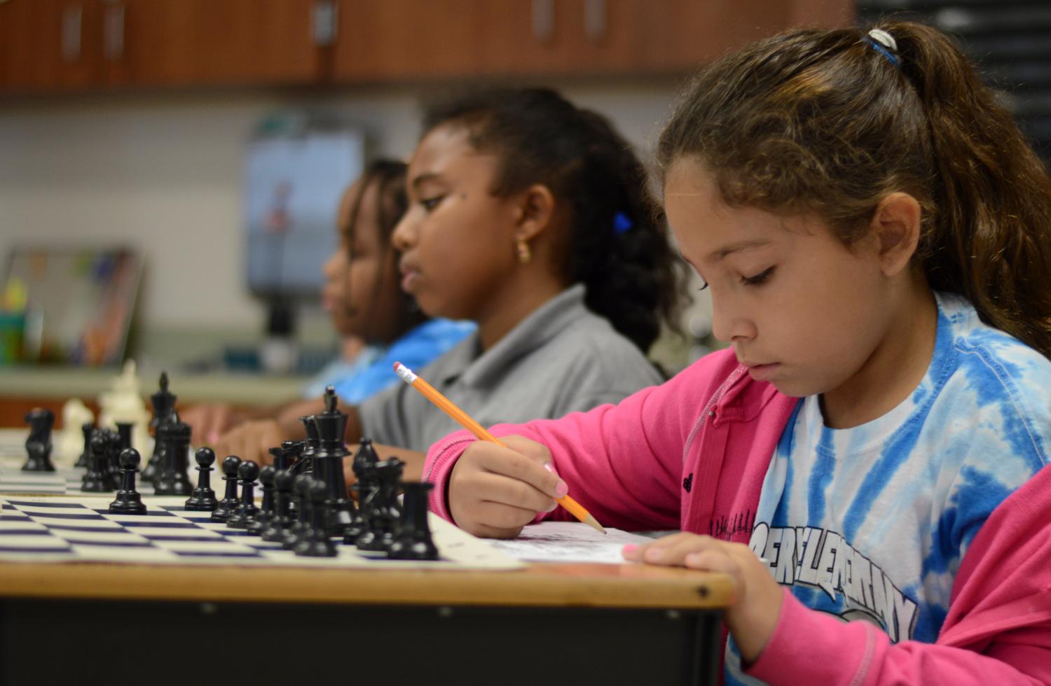 Hailey Rodelo participates in a chess-geography lesson at Discovery Elementary School in Sunrise, Florida