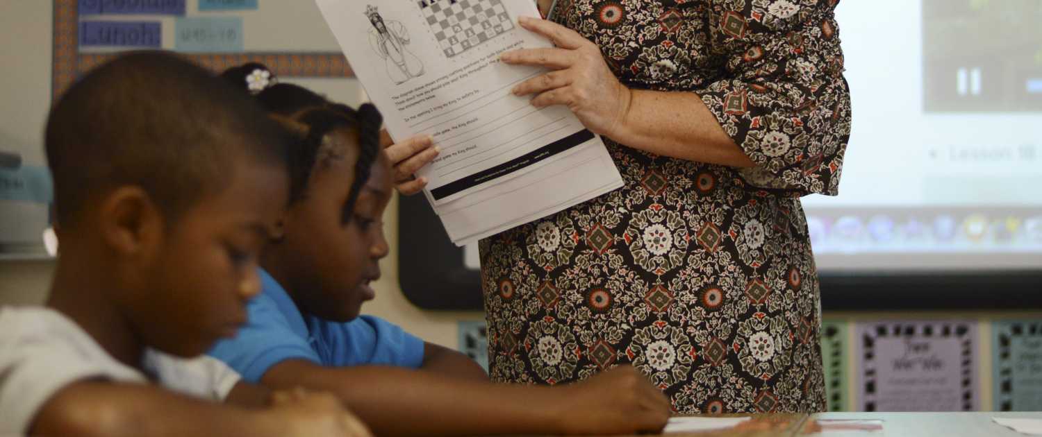 Third grade teacher Justine Maver instructs students during a chess-geography lesson at Discovery Elementary School in Sunrise, Florida