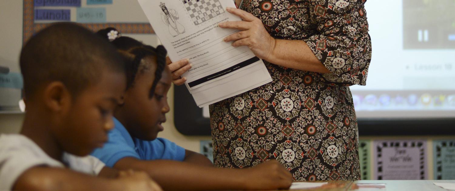 Third grade teacher Justine Maver instructs students during a chess-geography lesson at Discovery Elementary School in Sunrise, Florida