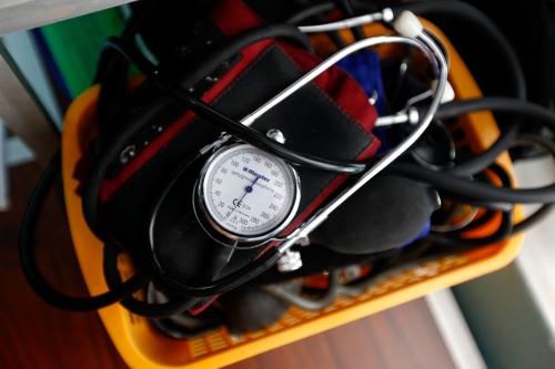 A blood-pressure machine is seen inside a basket.