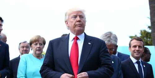 U.S. President Donald Trump reacts after a family photo at the G7 Summit expanded session in Taormina, Sicily, Italy, May 27, 2017. REUTERS/Alessandro Bianchi