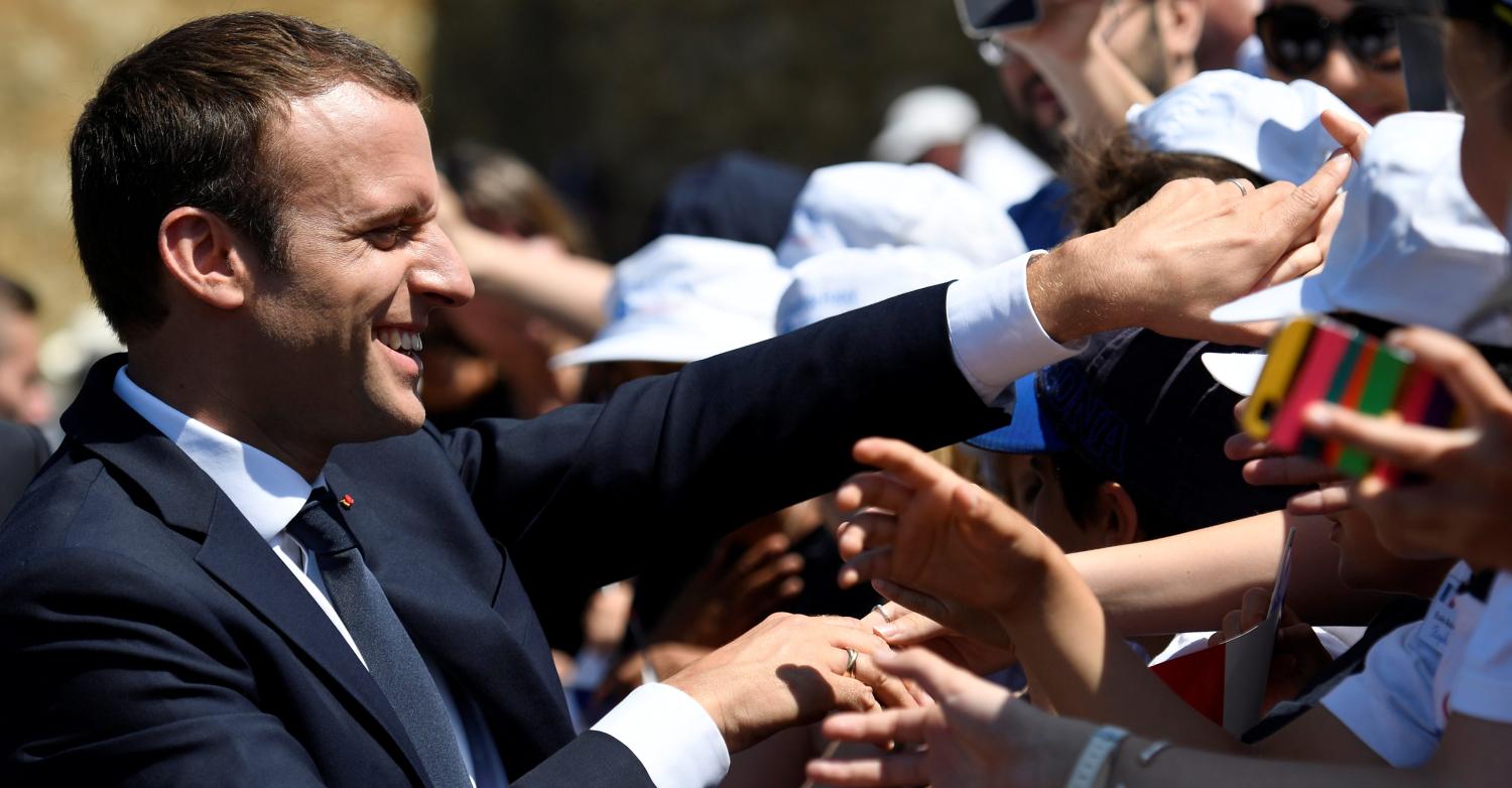 French President Emmanuel Macron (L) attends a ceremony marking the 77th anniversary of late French General Charles de Gaulle's resistance call of June 18, 1940, at the Mont Valerien memorial in Suresnes, near Paris, France, June 18, 2017. REUTERS/Bertrand Guay/Pool - RTS17JJO