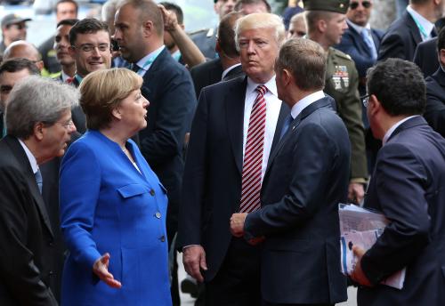 Italian Prime Minister Paolo Gentiloni, Germany’s Chancellor Angela Merkel, U.S. President Donald Trump and European Council President Donald Tusk attend the G7 summit in Taormina, Sicily, Italy, May 26, 2017. REUTERS/Alessandro Bianchi