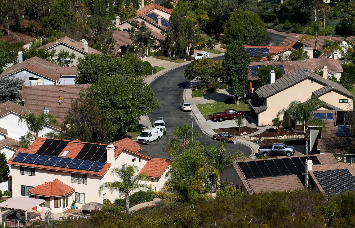 Multiple homes with solar panels are shown in Scripps Ranch, San Diego, California, U.S.