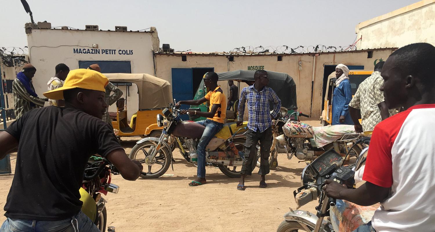 Moto taxis gather at a bus station that migrants often arrive at in Agadez, Niger, May 7, 2016. Picture taken May 7, 2016. To match Analysis EUROPE-MIGRANTS/AFRICA REUTERS/Joe Penney - RTSS2RO