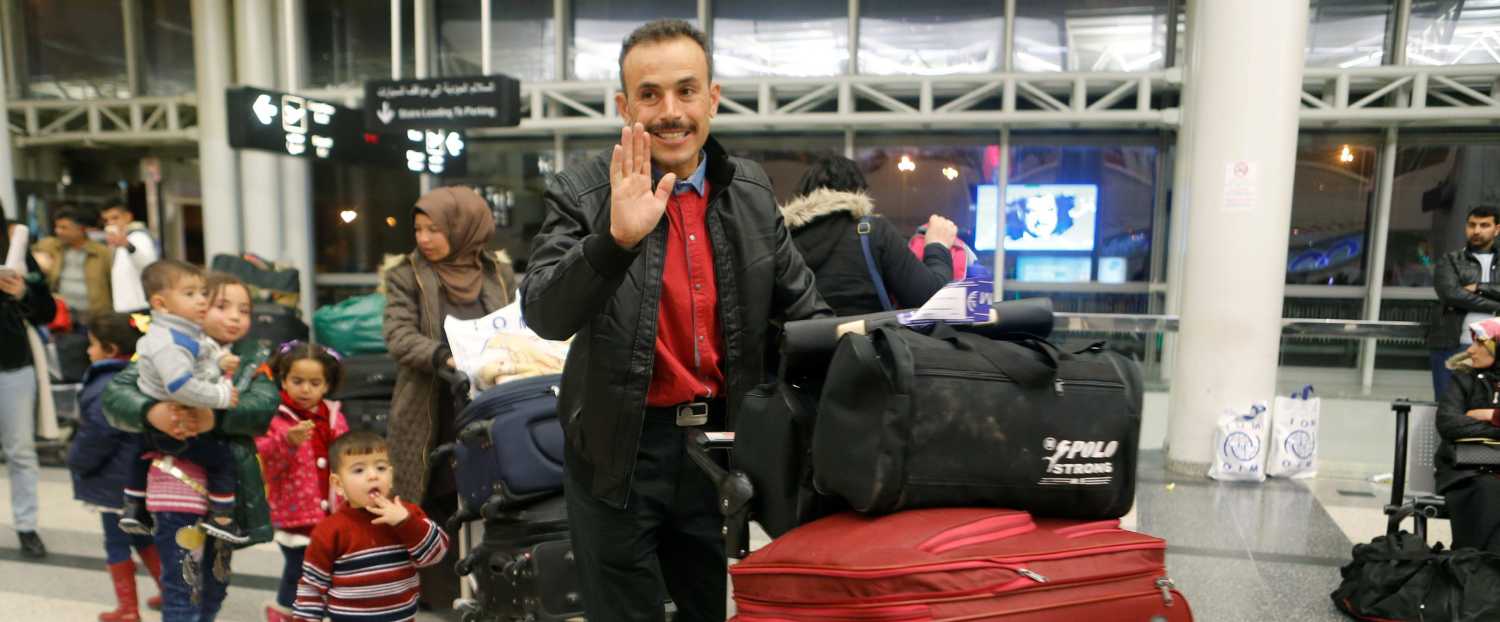 Members of a Syrian refugee family walk with their luggage at Beirut international airport ahead of their travel to the United States, Lebanon February 8, 2017. REUTERS/Mohamed Azakir - RTX304SU