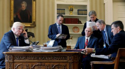 U.S. President Donald Trump (L-R), joined by Chief of Staff Reince Priebus, Vice President Mike Pence, senior advisor Steve Bannon, Communications Director Sean Spicer and National Security Advisor Michael Flynn, speaks by phone with Russia's President Vladimir Putin in the Oval Office at the White House in Washington, U.S.