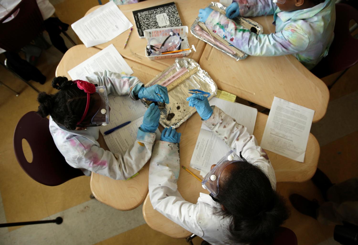 Students dissect owl pellets at the Excel Academy public charter school in Washington