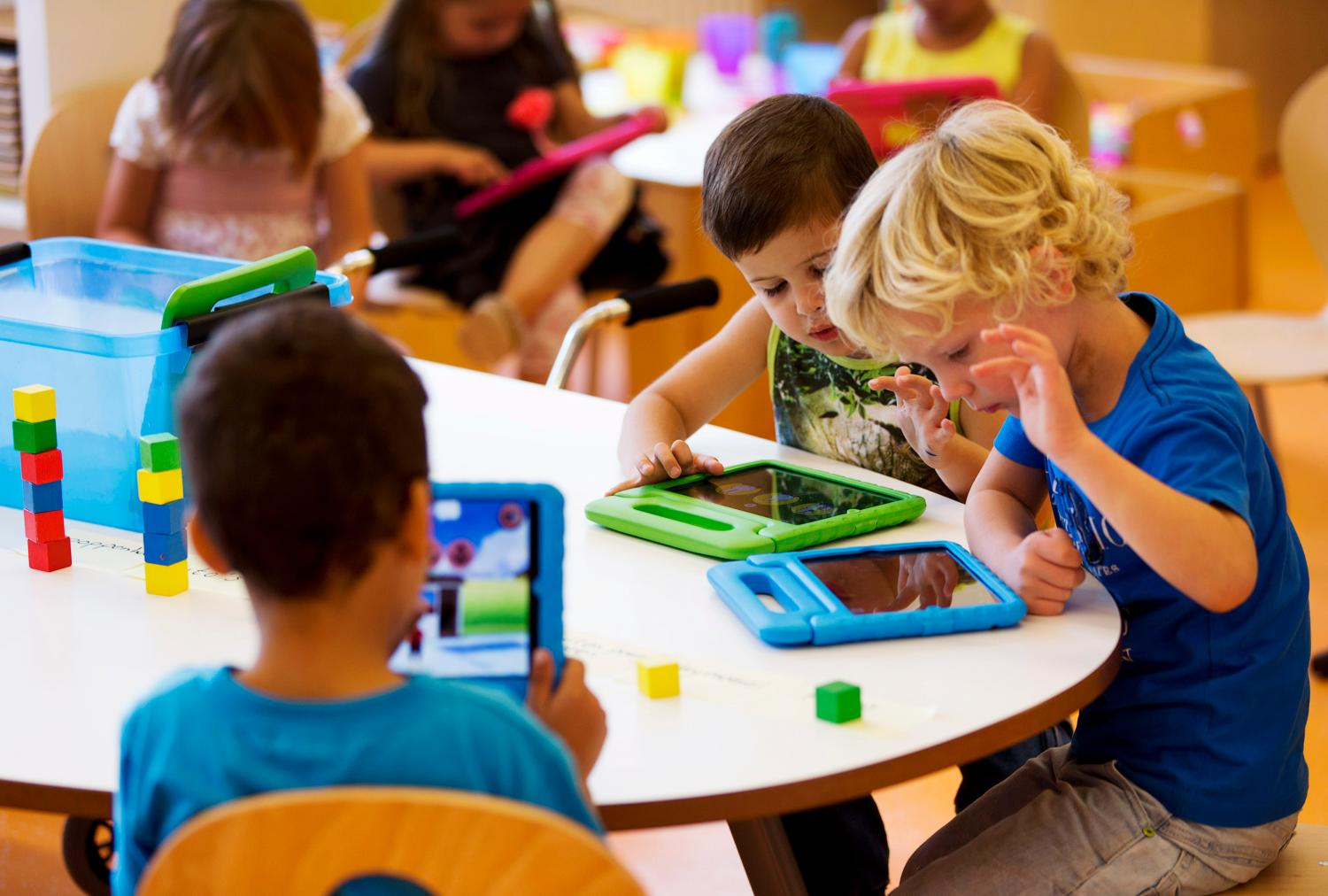 Students play with their iPads at the Steve Jobs school in Sneek