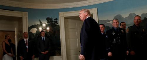 U.S. President Donald Trump departs after signing two bills boosting government support for law enforcement first responders, surrounded by law enforcement organization leaders at the White House in Washington, U.S. June 2, 2017. REUTERS/Jonathan Ernst - RTX38RK6