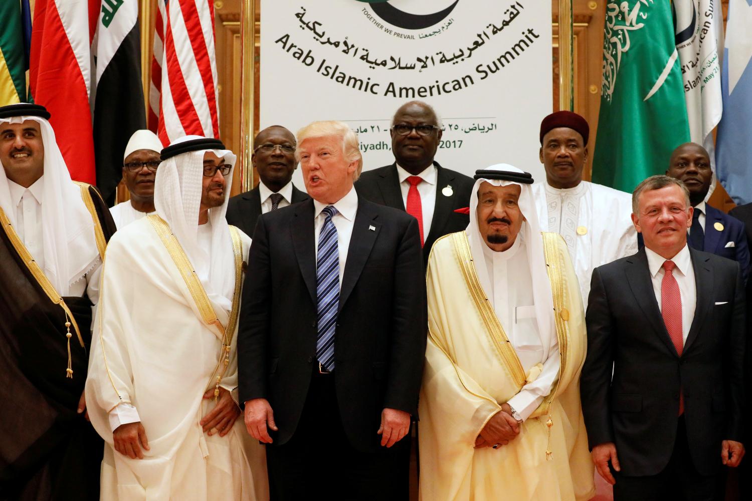 (Front R-L) Jordan's King Abdullah II, Saudi Arabia's King Salman bin Abdulaziz Al Saud, U.S. President Donald Trump, Abu Dhabi Crown Prince Sheikh Mohammed bin Zayed al-Nahyan and Qatar's Emir Sheikh Tamim Bin Hamad Al-Thani pose for a photo during Arab-Islamic-American Summit in Riyadh, Saudi Arabia May 21, 2017. REUTERS/Jonathan Ernst - RTX36UEB