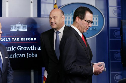 U.S. National Economic Director Gary Cohn (L) and Treasury Secretary Steven Mnuchin unveil the Trump administration's tax reform proposal.