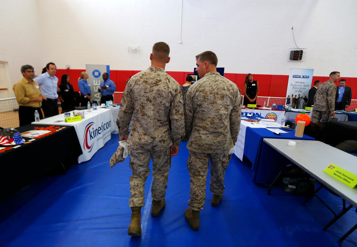 U.S. Marines attend a career and education fair at the Marine Corps Recruit Depot in San Diego