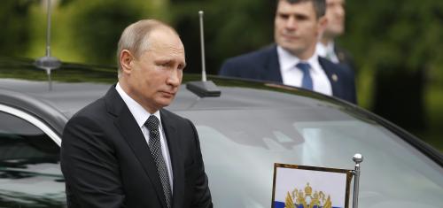 Russian President Vladimir Putin arrives to take part in a wreath-laying ceremony marking the anniversary of the Nazi German invasion in 1941 in Moscow, Russia June 22, 2017. REUTERS/Sergei Karpukhin - RTS1868N