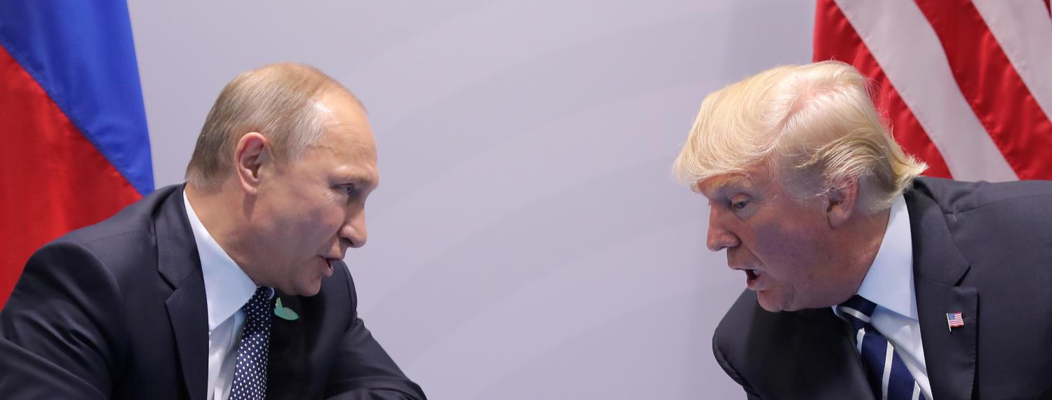 Russia's President Vladimir Putin talks to U.S. President Donald Trump during their bilateral meeting at the G20 summit in Hamburg, Germany July 7, 2017. REUTERS/Carlos Barria - RTX3AID8