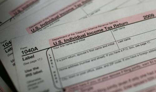 U.S. 1040A Individual Income Tax forms are seen at a U.S. Post office