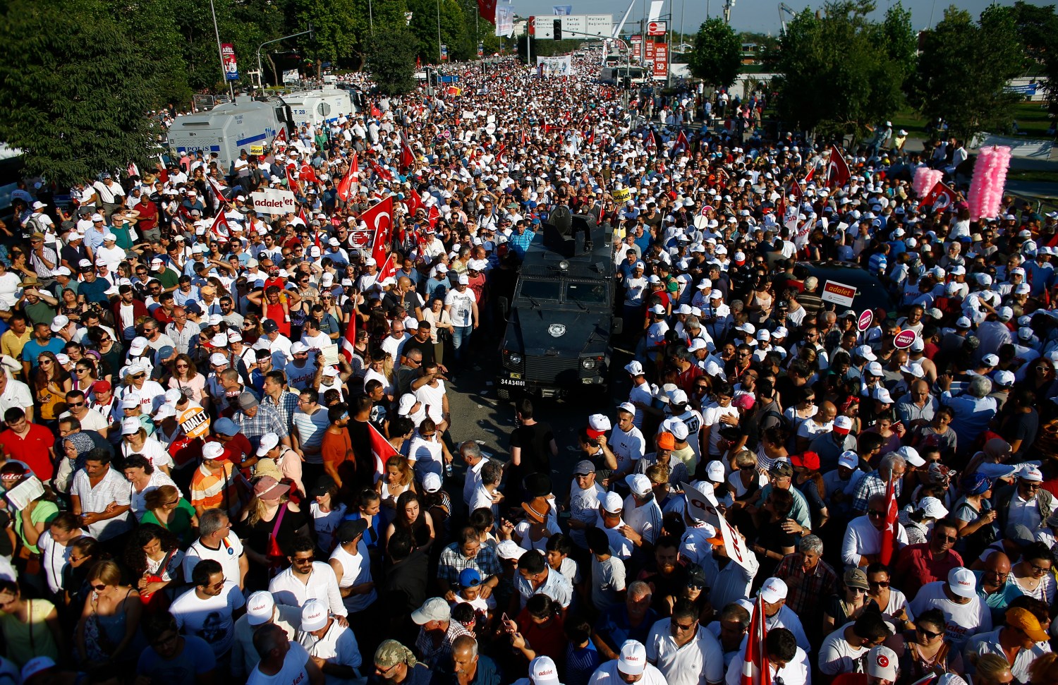 People wait for Turkeys main opposition Republican Peoples Party (CHP) leader Kemal Kilicdaroglu (not pictured) as he walks on the final stage of his 25-day long protest, dubbed Justice March, against the detention of the partys lawmaker Enis Berberoglu, in Istanbul, Turkey, July 9, 2017.