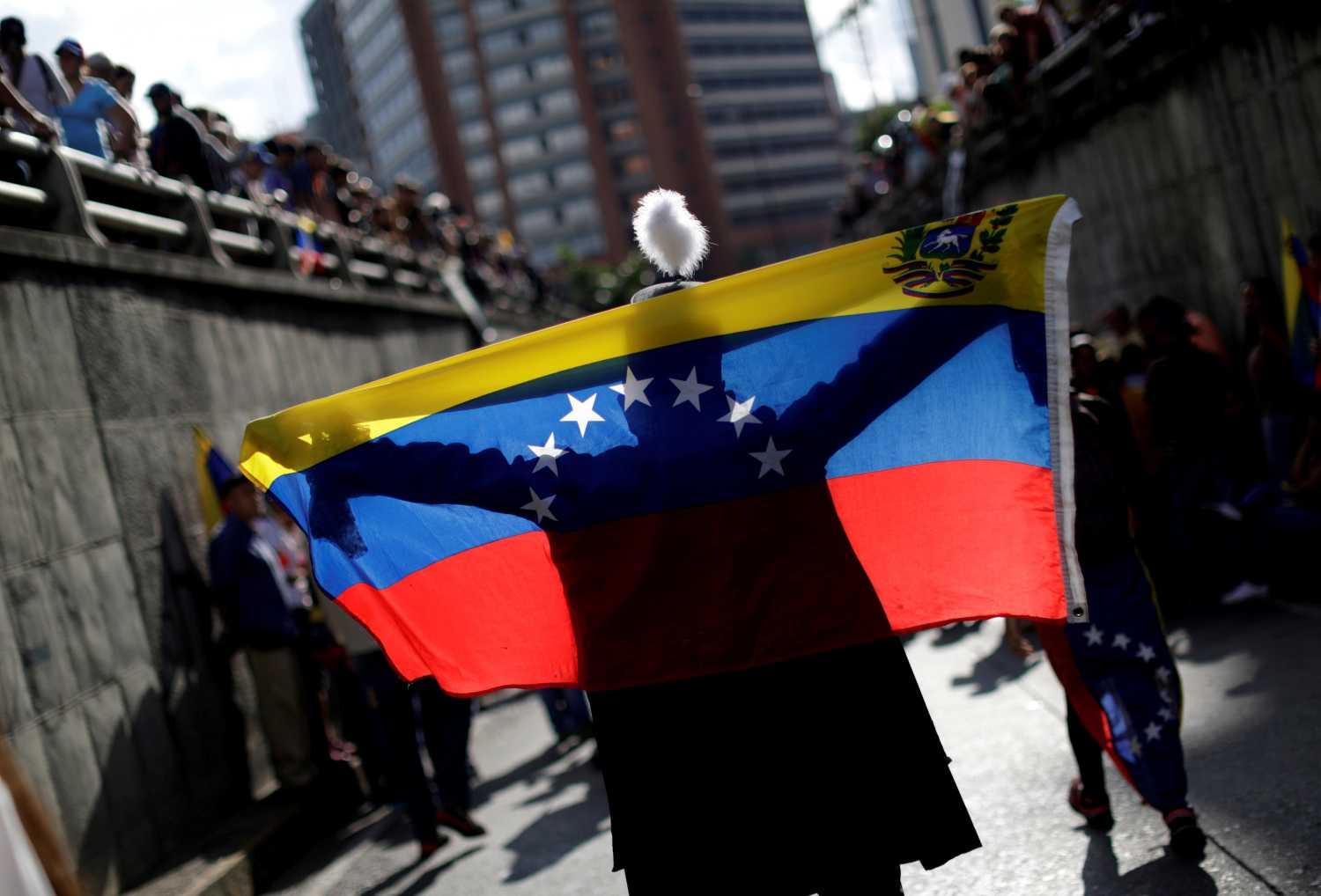Opposition supporters attend a rally to pay tribute to victims of violence during protests against Venezuelan President Nicolas Maduro's government in Caracas, Venezuela, July 24, 2017. REUTERS/Ueslei Marcelino TPX IMAGES OF THE DAY - RTX3CR9T