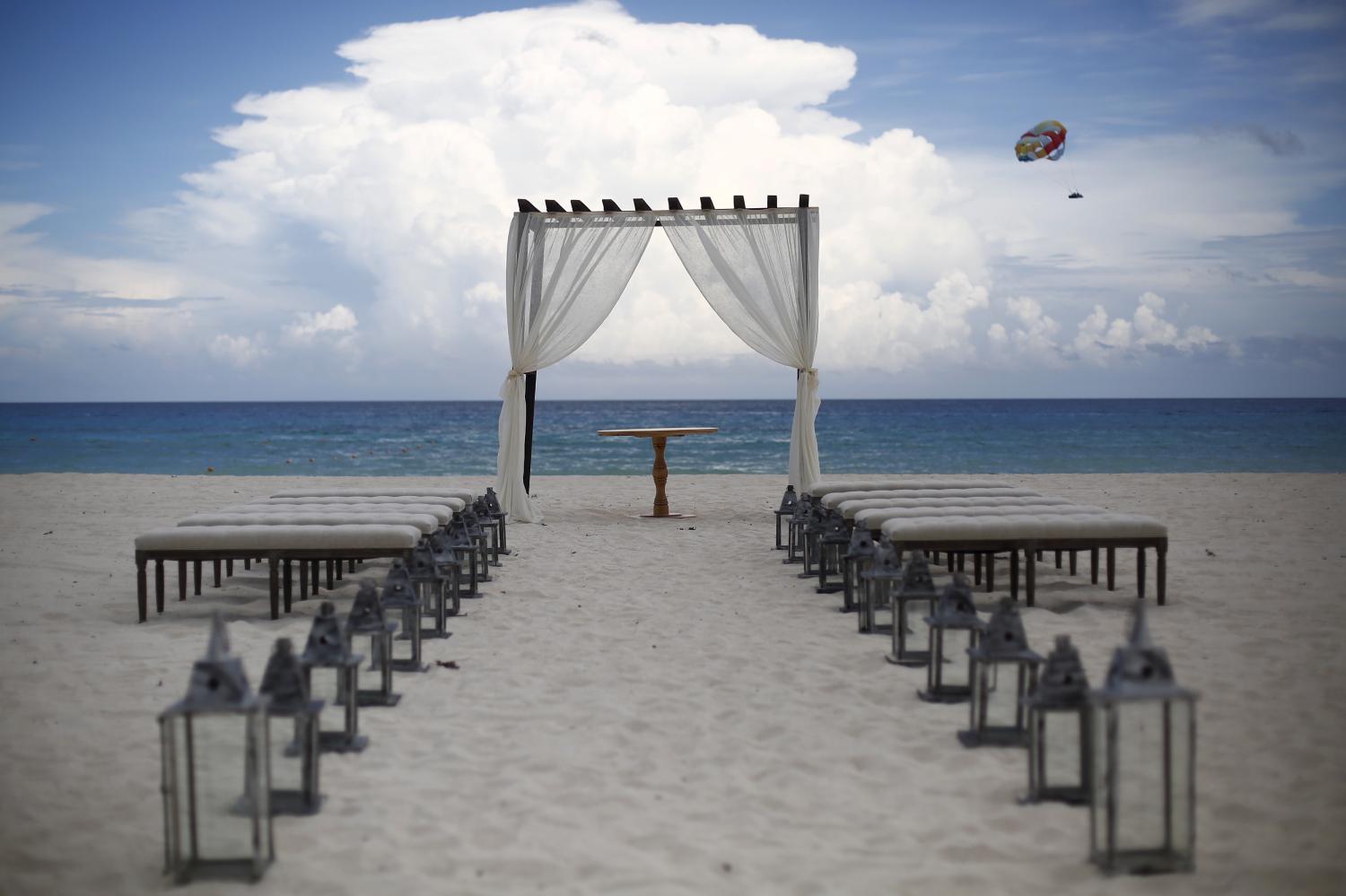 Preparations are made for a wedding on a beach in Cancun, August 15, 2015.