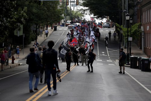 Members of white nationalists march in Charlottesville, Virginia, U.S., August 12, 2017. REUTERS/Joshua Roberts - RTS1BIBT