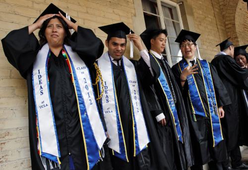 Pichardo stands in line with fellow graduating undocumented UCLA students at a church near the campus in Los Angeles