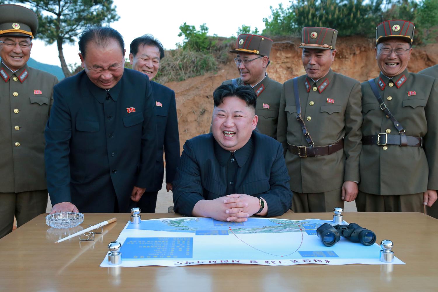 FILE PHOTO - North Korean leader Kim Jong Un reacts during the long-range strategic ballistic rocket Hwasong-12 (Mars-12) test launch in this undated photo released by North Korea's Korean Central News Agency (KCNA) on May 15, 2017. KCNA via REUTERS/File Photo REUTERS ATTENTION EDITORS - THIS IMAGE WAS PROVIDED BY A THIRD PARTY. REUTERS IS UNABLE TO INDEPENDENTLY VERIFY THIS IMAGE. NO THIRD PARTY SALES. SOUTH KOREA OUT. - RTX3DCTZ