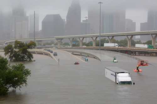 Interstate highway 45 is submerged from the effects of Hurricane Harvey seen during widespread flooding in Houston, Texas, U.S. August 27, 2017. REUTERS/Richard Carson TPX IMAGES OF THE DAY - RTX3DL7M