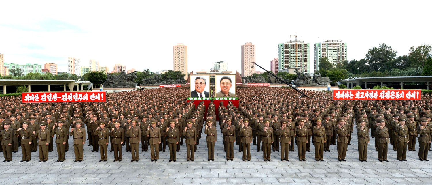 Servicepersons of the Ministry of People's Security met on August 10, 2017 to express full support for the Democratic People's Republic of Korea (DPRK) government statement, in this photo released on August 11, 2017 by North Korea's Korean Central News Agency (KCNA) in Pyongyang. KCNA/via REUTERS ATTENTION EDITORS - THIS IMAGE WAS PROVIDED BY A THIRD PARTY. REUTERS IS UNABLE TO INDEPENDENTLY VERIFY THIS IMAGE. NO THIRD PARTY SALES. SOUTH KOREA OUT. - RTS1B9UE