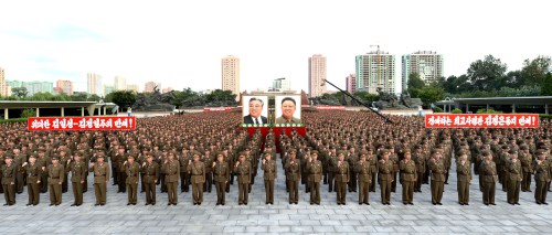 Servicepersons of the Ministry of People's Security met on August 10, 2017 to express full support for the Democratic People's Republic of Korea (DPRK) government statement, in this photo released on August 11, 2017 by North Korea's Korean Central News Agency (KCNA) in Pyongyang. KCNA/via REUTERS ATTENTION EDITORS - THIS IMAGE WAS PROVIDED BY A THIRD PARTY. REUTERS IS UNABLE TO INDEPENDENTLY VERIFY THIS IMAGE. NO THIRD PARTY SALES. SOUTH KOREA OUT. - RTS1B9UE