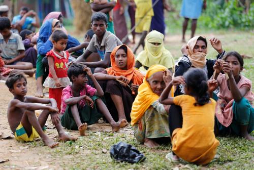 New Rohingya refugees wait to enter the Kutupalang makeshift refugee camp, in Coxs Bazar, Bangladesh, August 30, 2017. REUTERS/Mohammad Ponir Hossain - RC1F4D8C9AD0