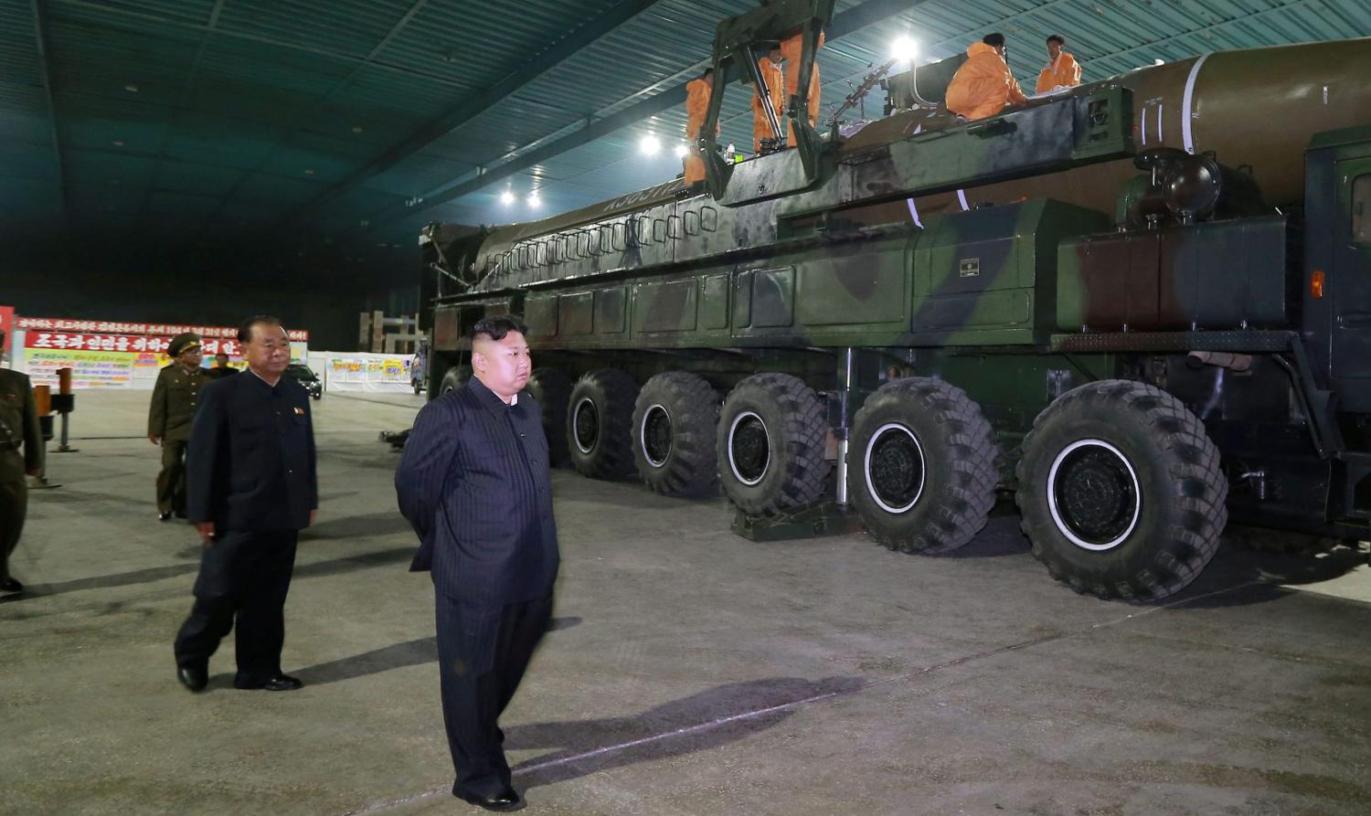 North Korean leader Kim Jong Un inspects the intercontinental ballistic missile Hwasong-14 in this undated photo released by North Korea's Korean Central News Agency (