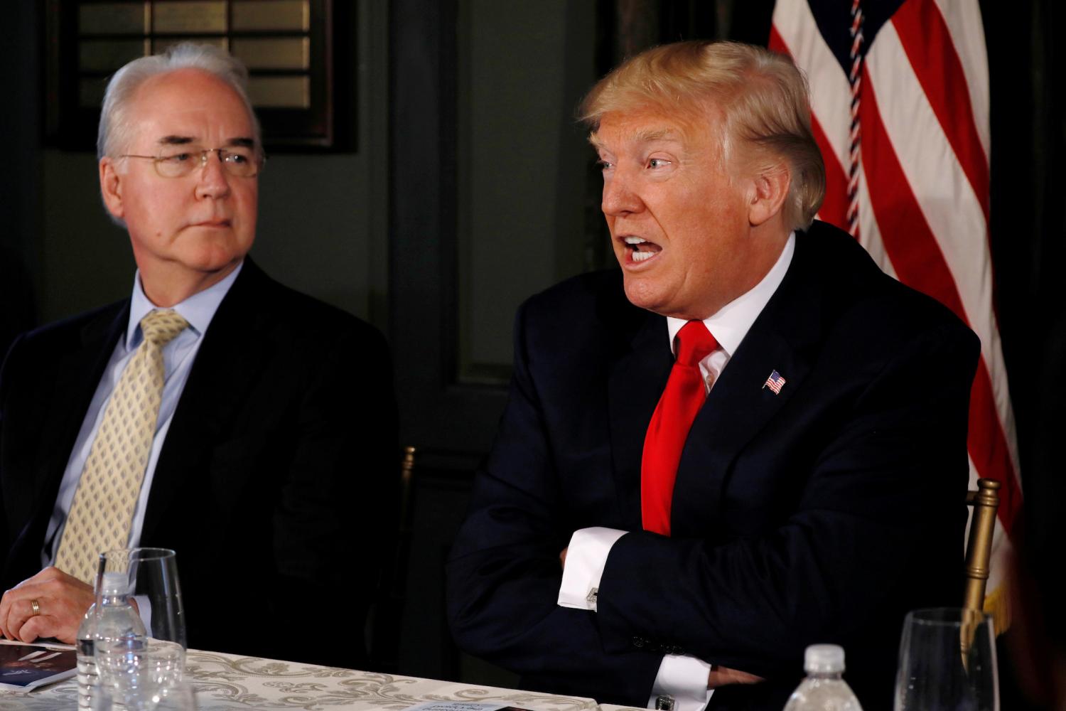 U.S. President Donald Trump (R) speaks about North Korea as he sits beside U.S. Secretary of Health and Human Services (HHS) Tom Price (L) during an opioid-related briefing at Trump's golf estate in Bedminster, New Jersey, U.S., August 8, 2017. REUTERS/Jonathan Ernst - RTS1AYEF