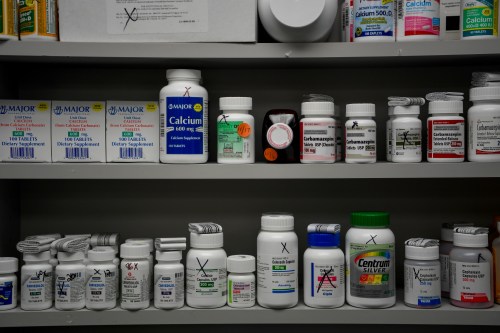 Picture of bottles of medication in a pharmacy