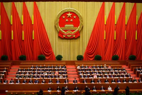 Delegates attend the fourth plenary meeting of the National People's Congress (NPC) at the Great Hall of the People in Beijing, March 14, 2013. China's parliament formally elected heir-in-waiting Xi Jinping as the country's new president on Thursday, succeeding Hu Jintao, putting the final seal of approval on a generational transition of power. REUTERS/Jason Lee (CHINA - Tags: POLITICS ELECTIONS) - GM1E93E13AD01