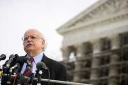 Fred Wertheimer speaks at a microphone