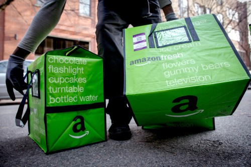 An Amazon worker delivers groceries from the Amazon Fresh service in the Brooklyn Borough of New York