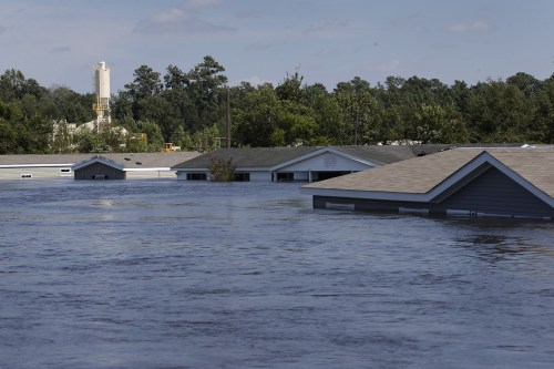 Submerged houses are seen by flood waters from Tropical Storm Harvey in Rose City