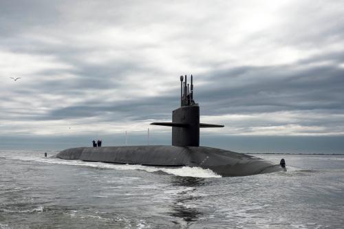 The Ohio-class ballistic missile submarine USS Tennessee returns to Naval Submarine Base Kings Bay, Georgia in this February 6, 2013 handout photo. The Tennessee and 13 other Ohio-class submarines are critical elements of the U.S. nuclear deterrent but the oldest has been in service for 33 years and the end of the fleet's useful life of 42 years is in sight. Every nuclear weapons delivery system in the U.S. arsenal ? the so-called triad of bombers, ballistic missiles and submarines ? will have to be replaced in the coming 30 years. REUTERS/Mass Communication Specialist 1st Class James Kimber/U.S. Navy/Handout via Reuters (UNITED STATES) - Tags: MILITARY POLITICS) THIS IMAGE HAS BEEN SUPPLIED BY A THIRD PARTY. IT IS DISTRIBUTED, EXACTLY AS RECEIVED BY REUTERS, AS A SERVICE TO CLIENTS. FOR EDITORIAL USE ONLY. NOT FOR SALE FOR MARKETING OR ADVERTISING CAMPAIGNS - TM3EAAK0WCJ01