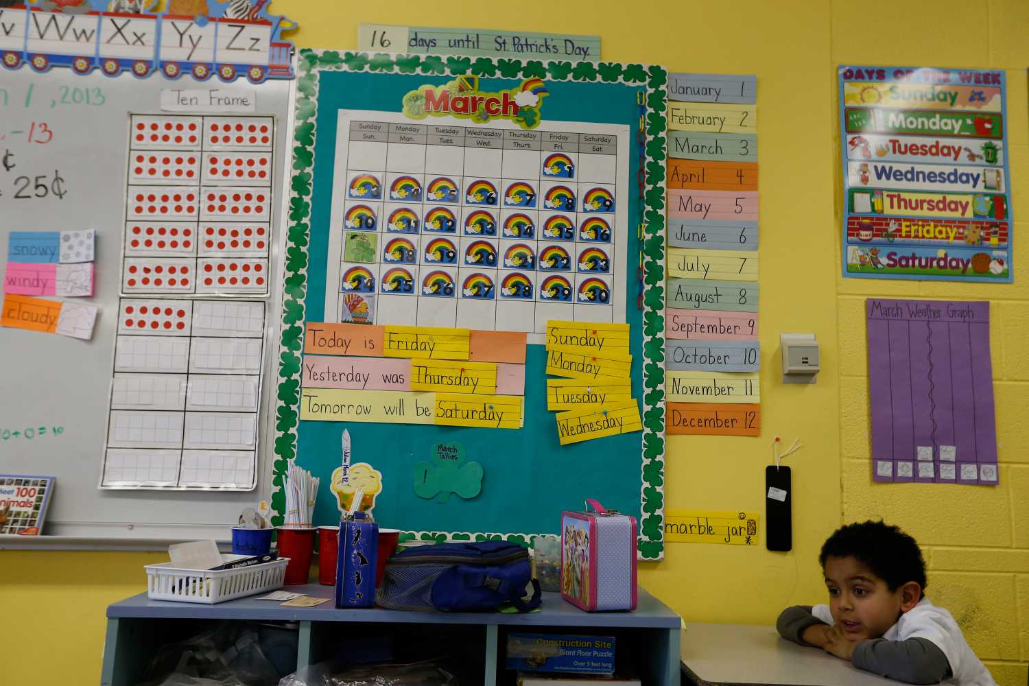 A student in a kindergarten class listens to his teacher at Walsh Elementary School in Chicago, Illinois