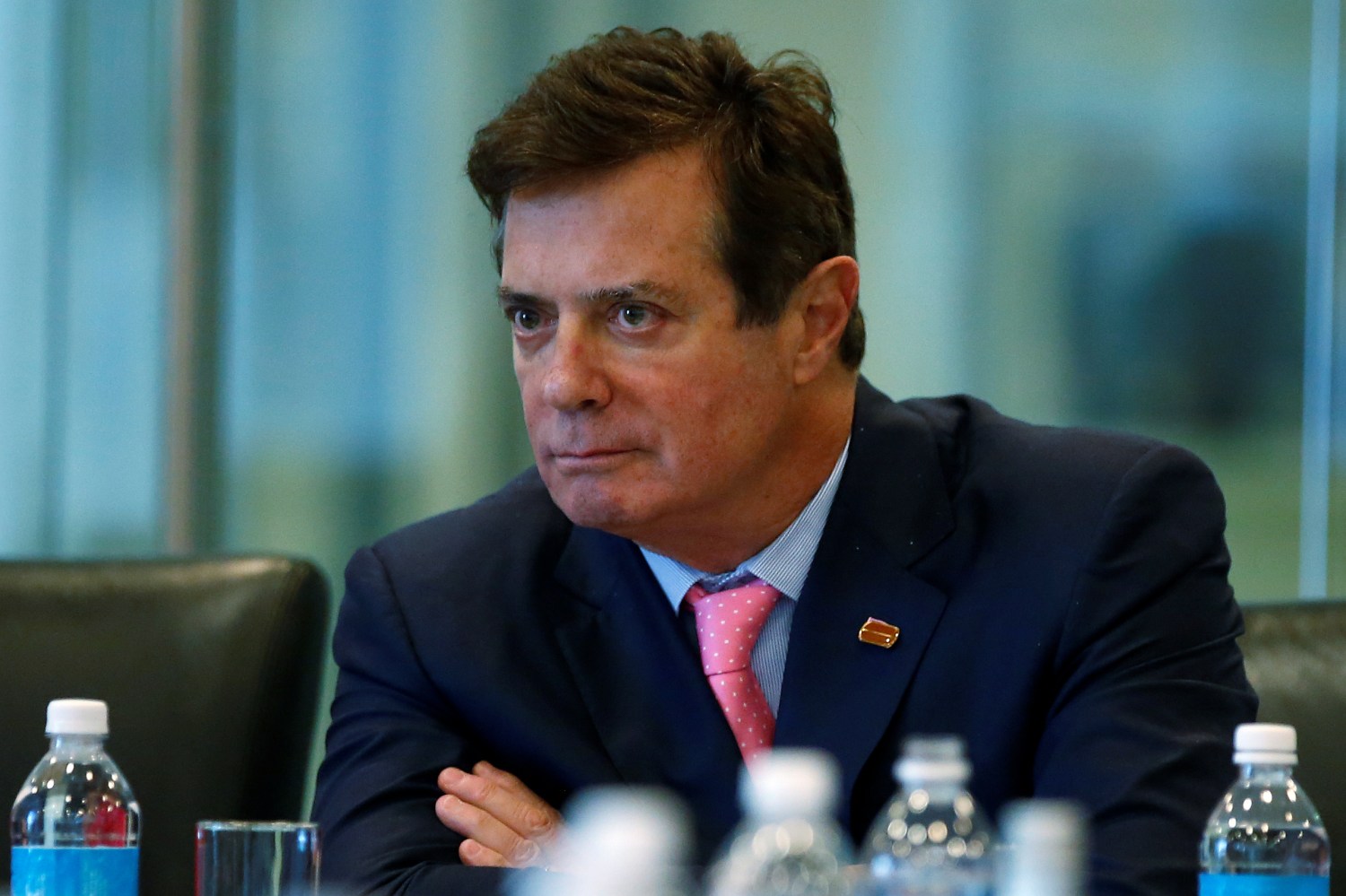 Paul Manafort of Republican presidential nominee Donald Trump's staff listens during a round table discussion on security at Trump Tower in the Manhattan borough of New York, U.S., August 17, 2016. Picture taken August 17, 2016. REUTERS/Carlo Allegri - S1AETWIWWYAA