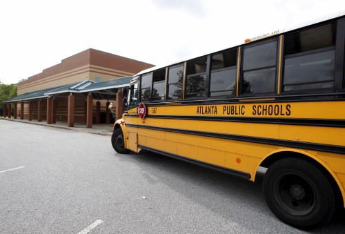 An Atlanta Public Schools bus is parked at Dobbs Elementary School in Atlanta, Georgia