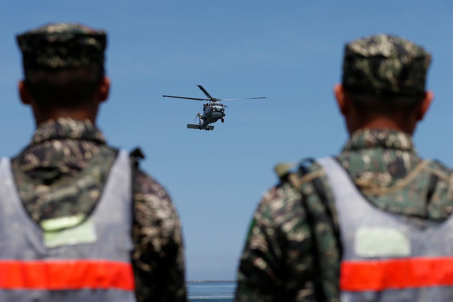 A Sikorsky S-70C helicopter takes part in a military drill at navy base in Kaohsiung, Taiwan