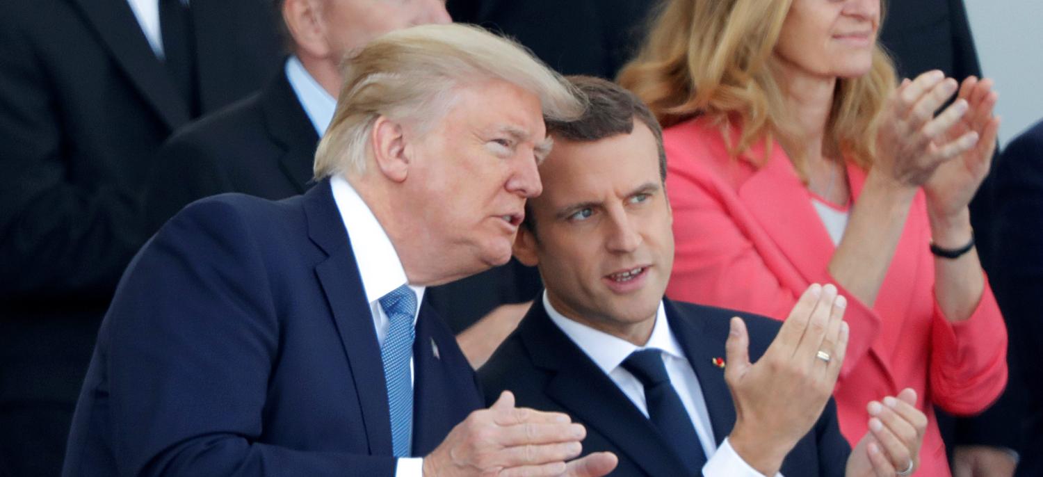 French President Emmanuel Macron and U.S. President Donald Trump attend the traditional Bastille Day military parade on the Champs-Elysees in Paris, France, July 14, 2017. REUTERS/Charles Platiau - RC19B21BBA20